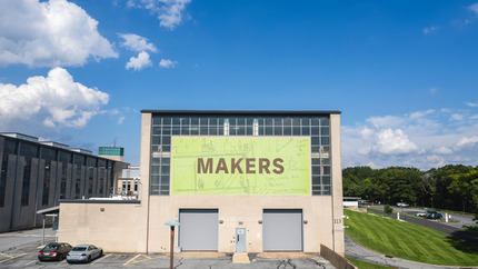 &quot;Makers&quot; Sign on Exterior of High Bay